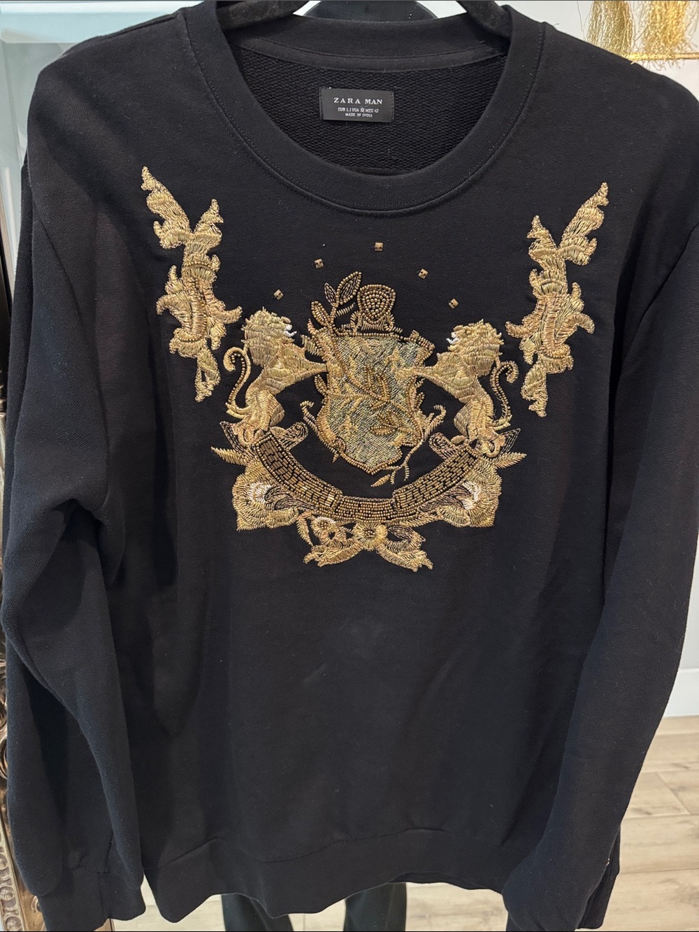 Zara Black Crewneck Sweater with Gold Embroidered Crest Motif
